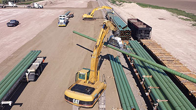 Adams Transloading Pipe on CAT Industrial Crane